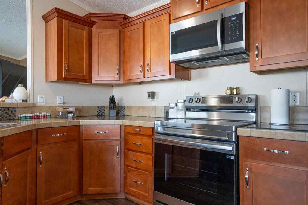 MLS® A2251146 - 5219 44th Street  in NONE Clive, Residential