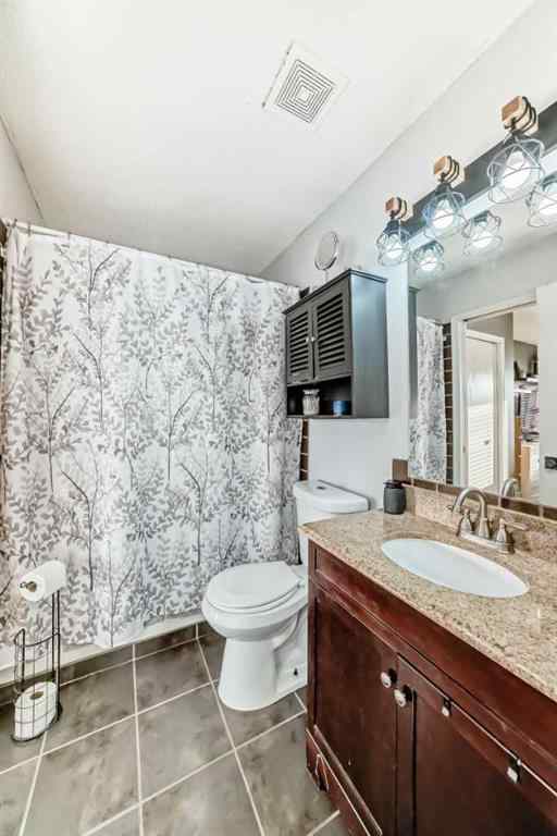 MLS® A2251155 - 7126 Laguna Way NE in Monterey Park Calgary, Residential