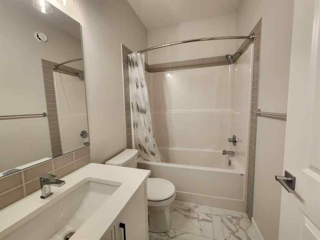 MLS® A2251173 - 73 Herron Common NE in Livingston Calgary, Residential