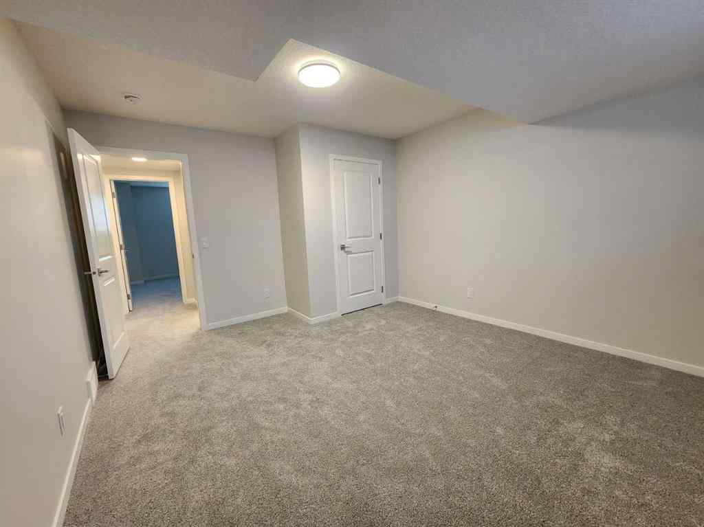 MLS® A2251173 - 73 Herron Common NE in Livingston Calgary, Residential