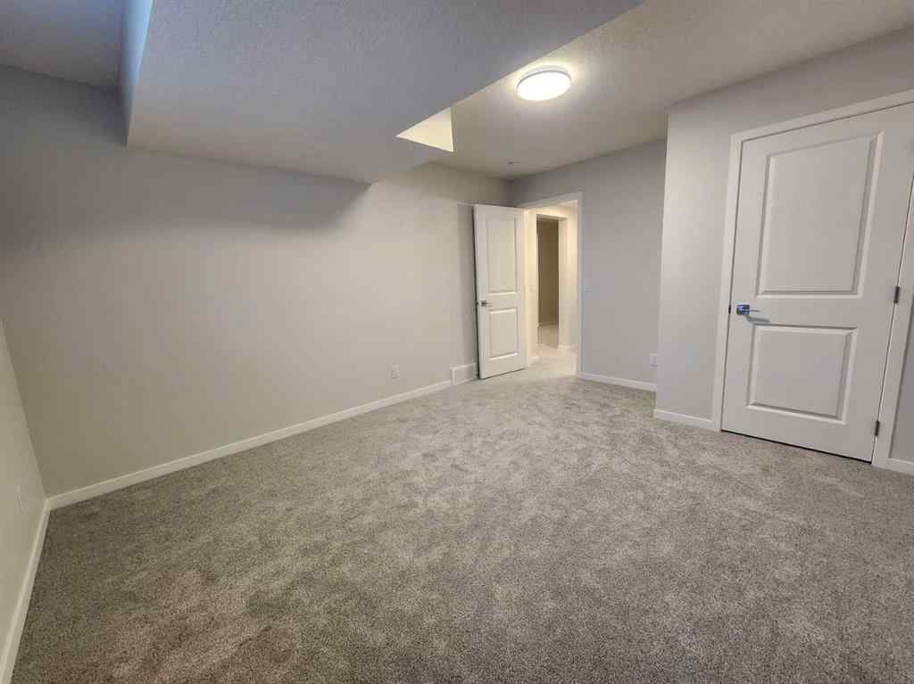 MLS® A2251173 - 73 Herron Common NE in Livingston Calgary, Residential