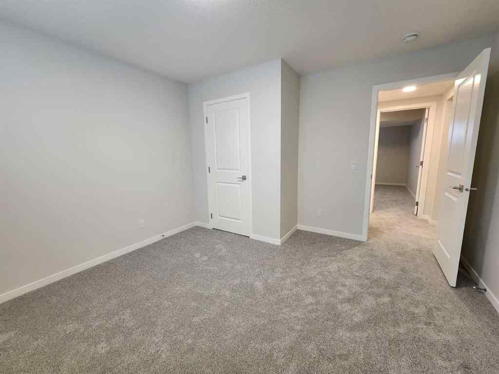 MLS® A2251173 - 73 Herron Common NE in Livingston Calgary, Residential