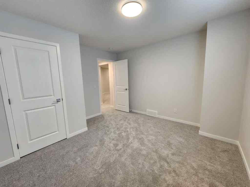 MLS® A2251173 - 73 Herron Common NE in Livingston Calgary, Residential