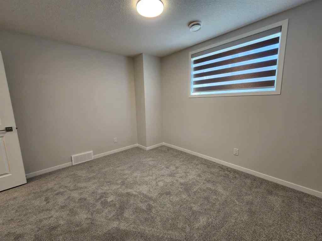 MLS® A2251173 - 73 Herron Common NE in Livingston Calgary, Residential