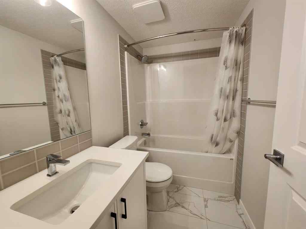 MLS® A2251173 - 73 Herron Common NE in Livingston Calgary, Residential
