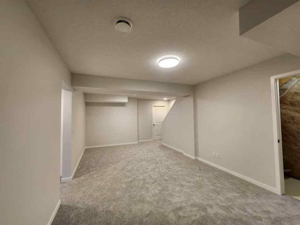 MLS® A2251173 - 73 Herron Common NE in Livingston Calgary, Residential