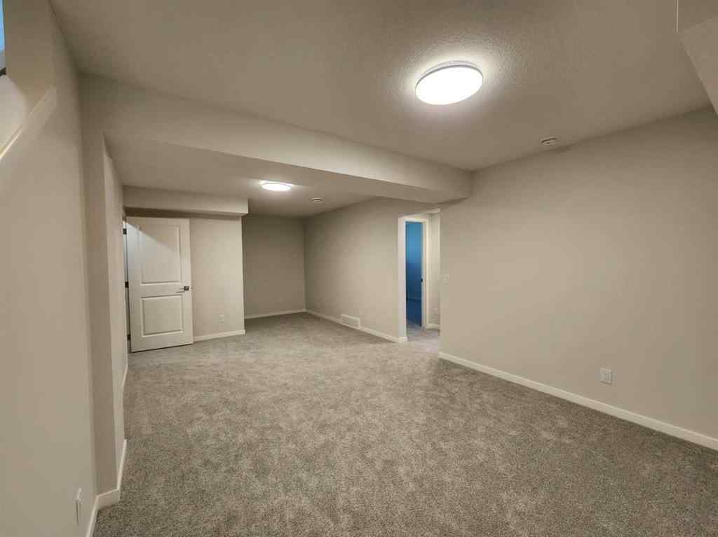 MLS® A2251173 - 73 Herron Common NE in Livingston Calgary, Residential