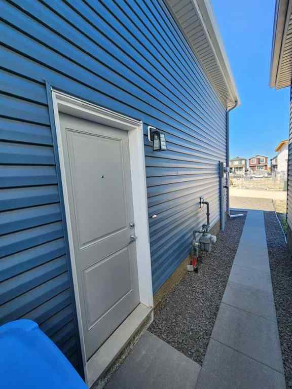 MLS® A2251173 - 73 Herron Common NE in Livingston Calgary, Residential