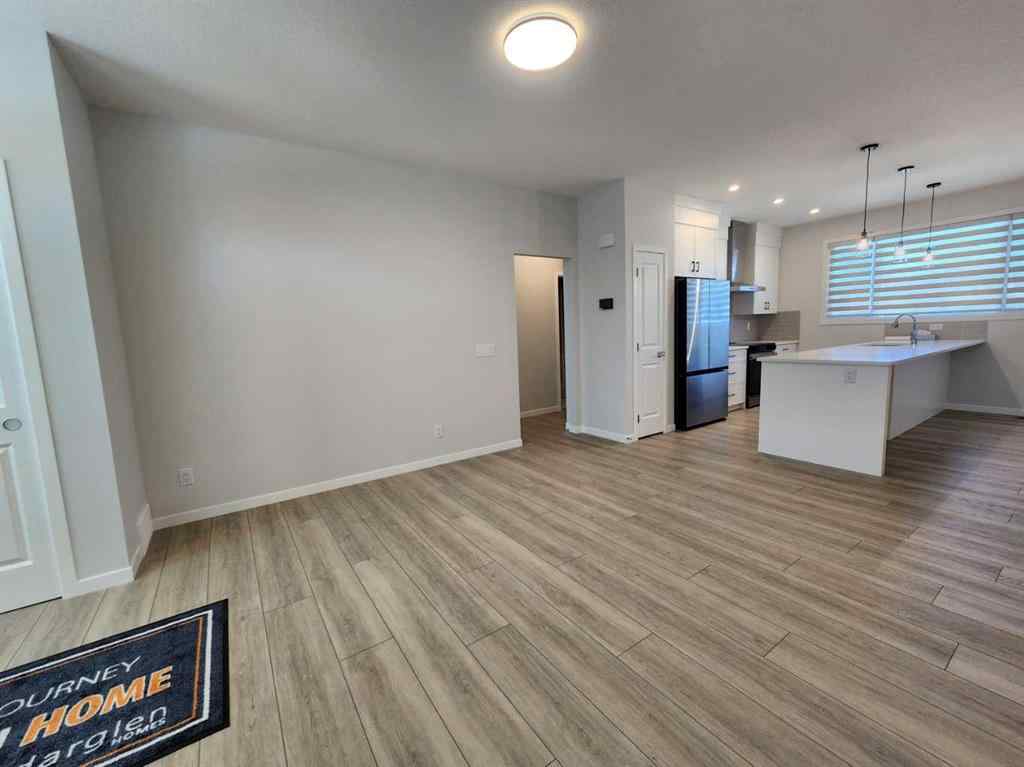 MLS® A2251173 - 73 Herron Common NE in Livingston Calgary, Residential