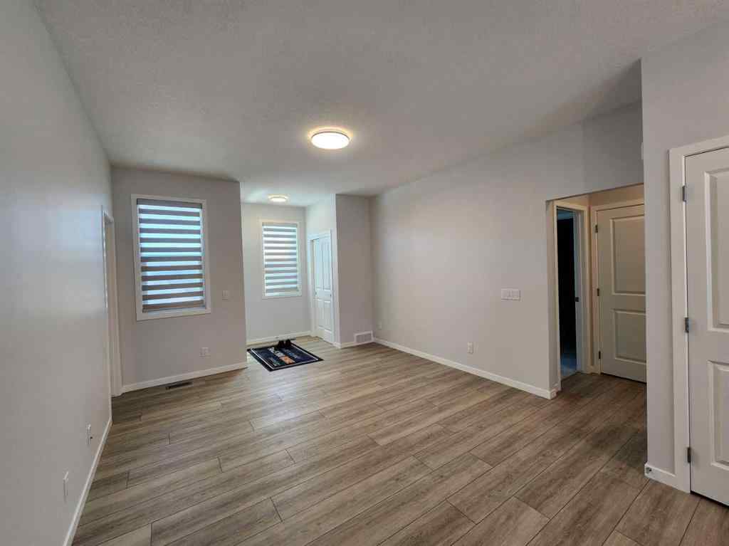 MLS® A2251173 - 73 Herron Common NE in Livingston Calgary, Residential