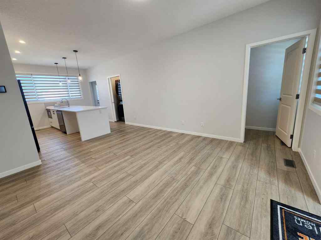 MLS® A2251173 - 73 Herron Common NE in Livingston Calgary, Residential