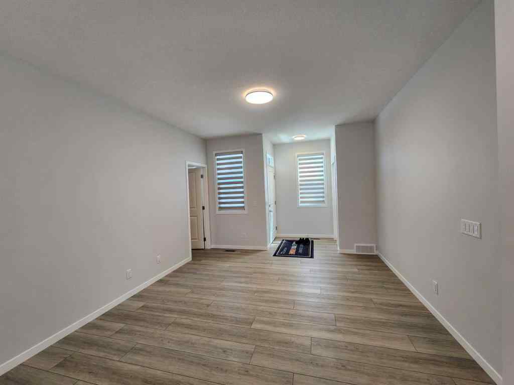 MLS® A2251173 - 73 Herron Common NE in Livingston Calgary, Residential