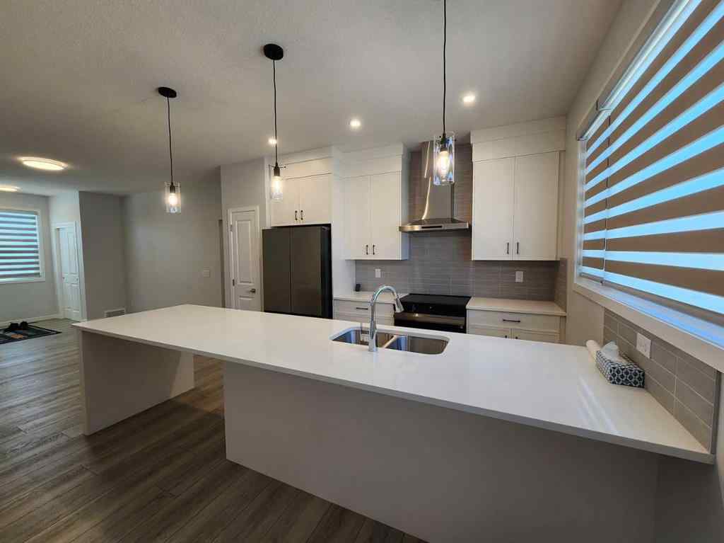 MLS® A2251173 - 73 Herron Common NE in Livingston Calgary, Residential