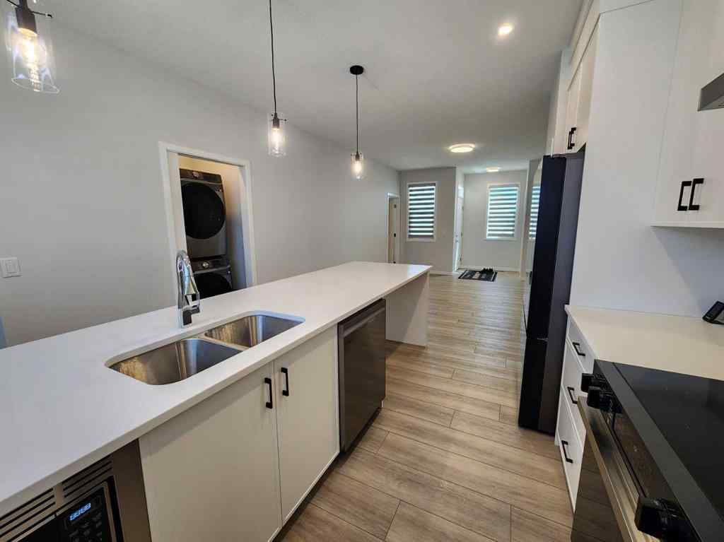MLS® A2251173 - 73 Herron Common NE in Livingston Calgary, Residential