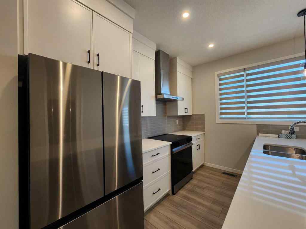 MLS® A2251173 - 73 Herron Common NE in Livingston Calgary, Residential