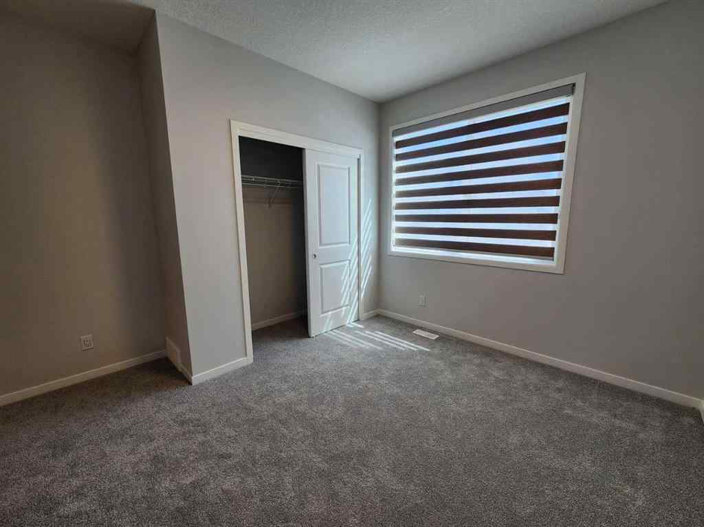 MLS® A2251173 - 73 Herron Common NE in Livingston Calgary, Residential