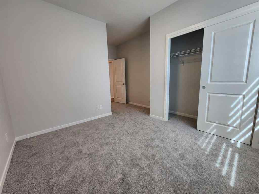 MLS® A2251173 - 73 Herron Common NE in Livingston Calgary, Residential