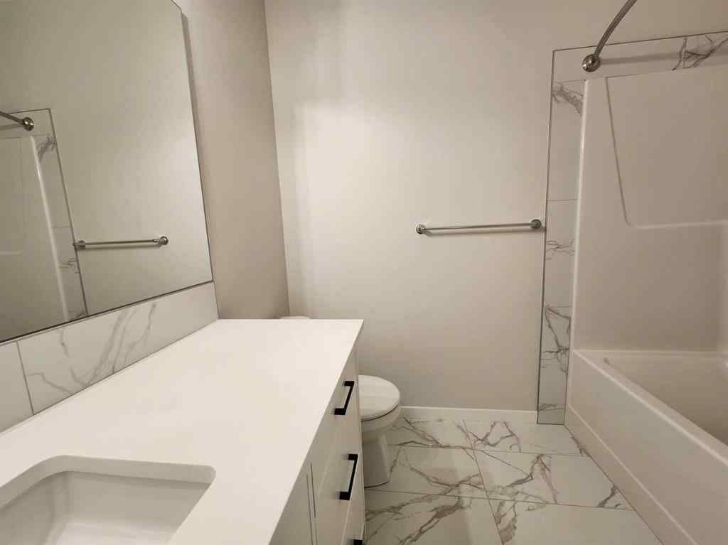 MLS® A2251173 - 73 Herron Common NE in Livingston Calgary, Residential