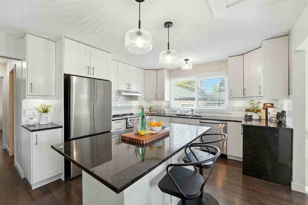 MLS® A2251194 - 207 Pinecrest Crescent NE in Pineridge Calgary, Residential