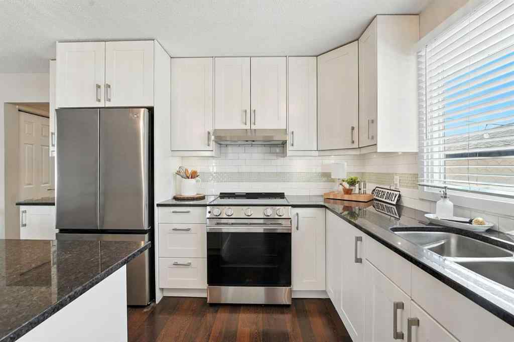 MLS® A2251194 - 207 Pinecrest Crescent NE in Pineridge Calgary, Residential