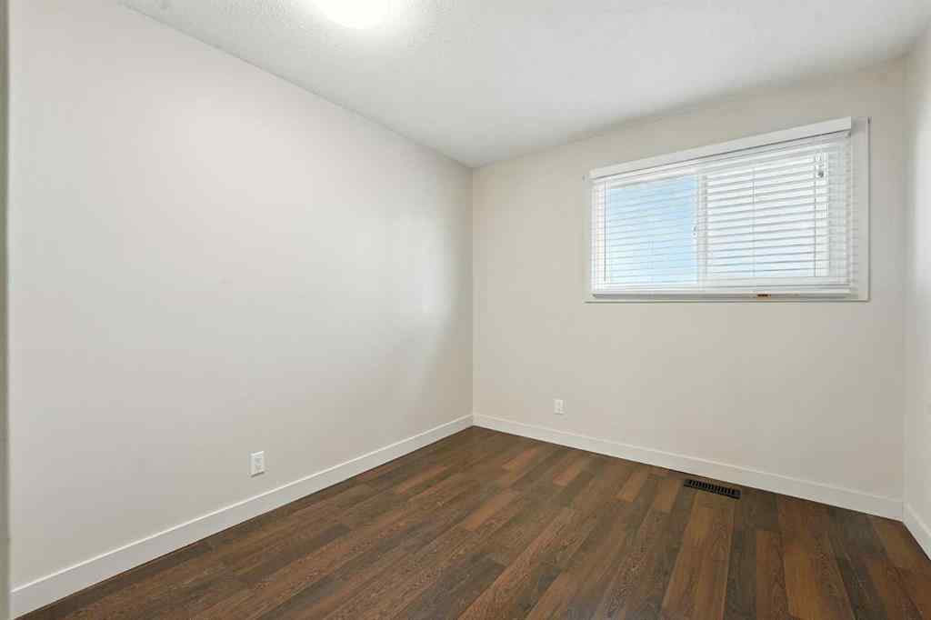 MLS® A2251194 - 207 Pinecrest Crescent NE in Pineridge Calgary, Residential