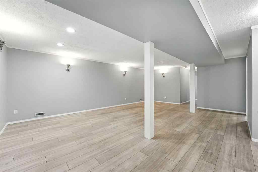 MLS® A2251194 - 207 Pinecrest Crescent NE in Pineridge Calgary, Residential