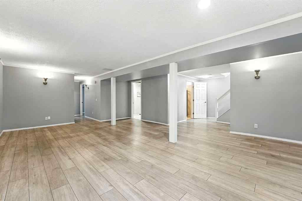 MLS® A2251194 - 207 Pinecrest Crescent NE in Pineridge Calgary, Residential