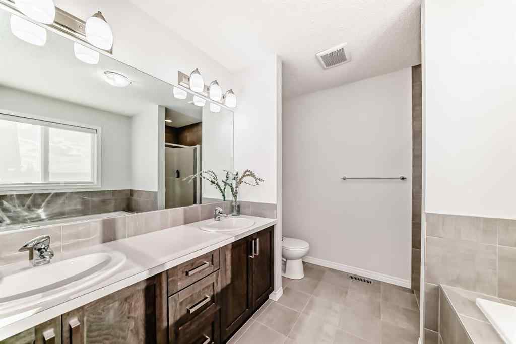 MLS® A2251204 - 114 Walgrove Green SE in Walden Calgary, Residential
