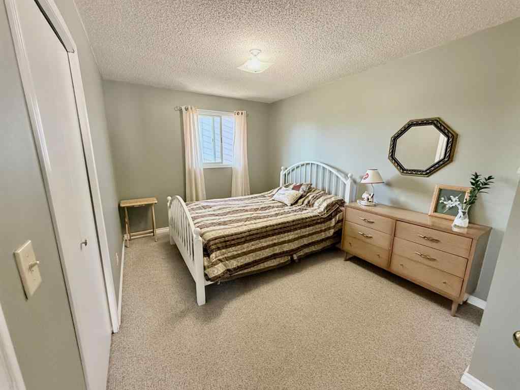 MLS® A2251249 - 807 8 Avenue SE in Emerson Lake Estates High River, Residential