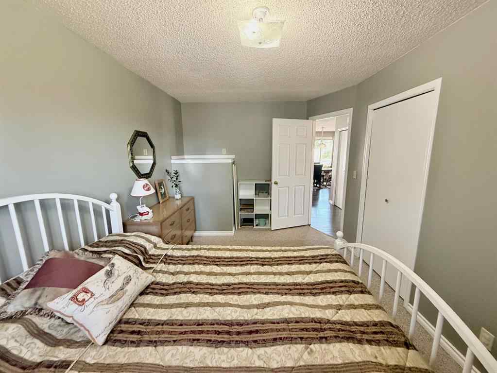 MLS® A2251249 - 807 8 Avenue SE in Emerson Lake Estates High River, Residential