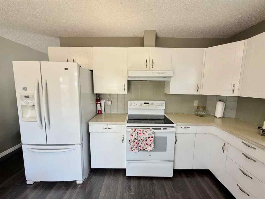 MLS® A2251249 - 807 8 Avenue SE in Emerson Lake Estates High River, Residential
