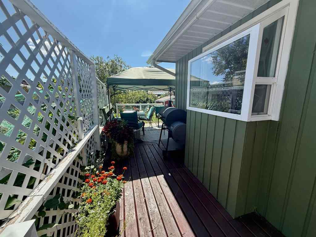 MLS® A2251249 - 807 8 Avenue SE in Emerson Lake Estates High River, Residential