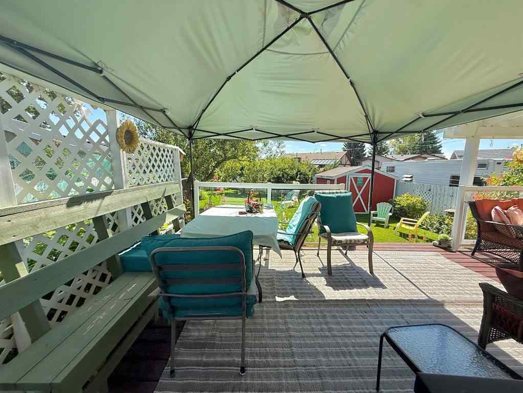 MLS® A2251249 - 807 8 Avenue SE in Emerson Lake Estates High River, Residential