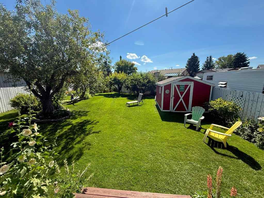 MLS® A2251249 - 807 8 Avenue SE in Emerson Lake Estates High River, Residential