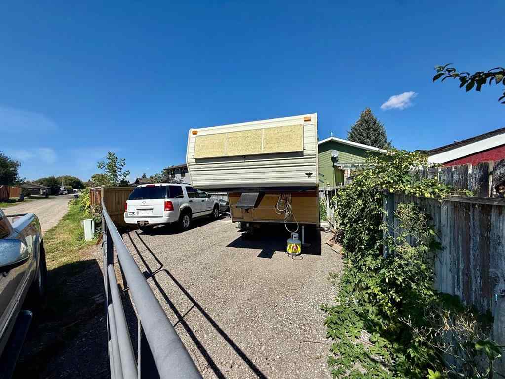 MLS® A2251249 - 807 8 Avenue SE in Emerson Lake Estates High River, Residential