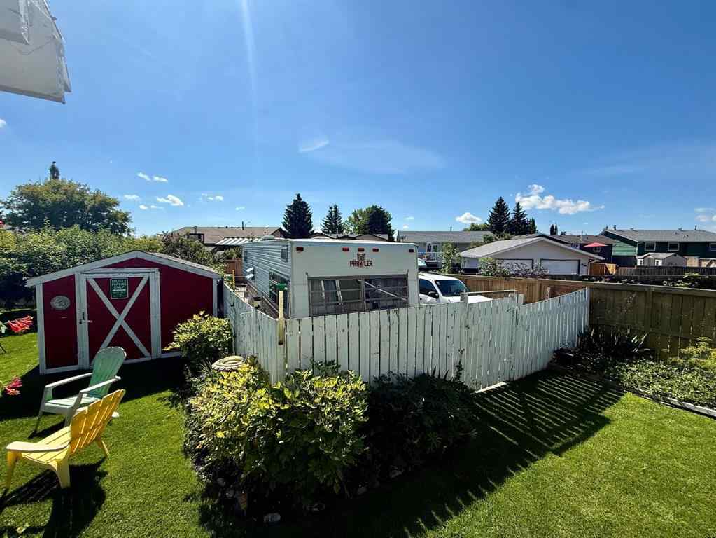 MLS® A2251249 - 807 8 Avenue SE in Emerson Lake Estates High River, Residential