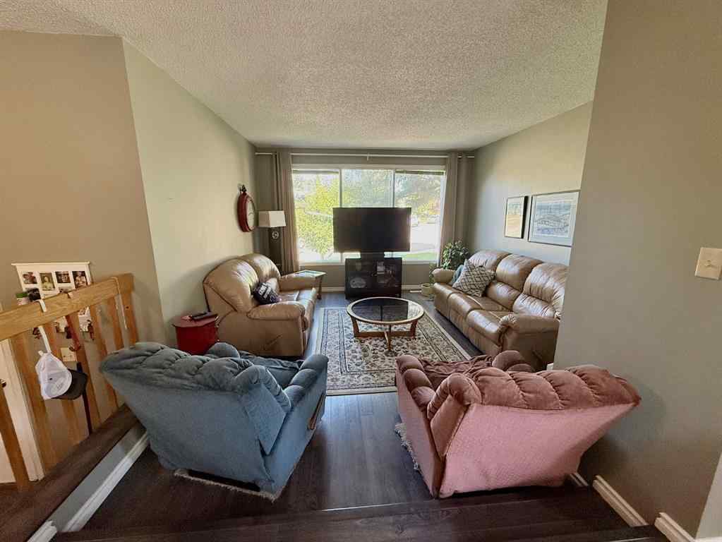 MLS® A2251249 - 807 8 Avenue SE in Emerson Lake Estates High River, Residential
