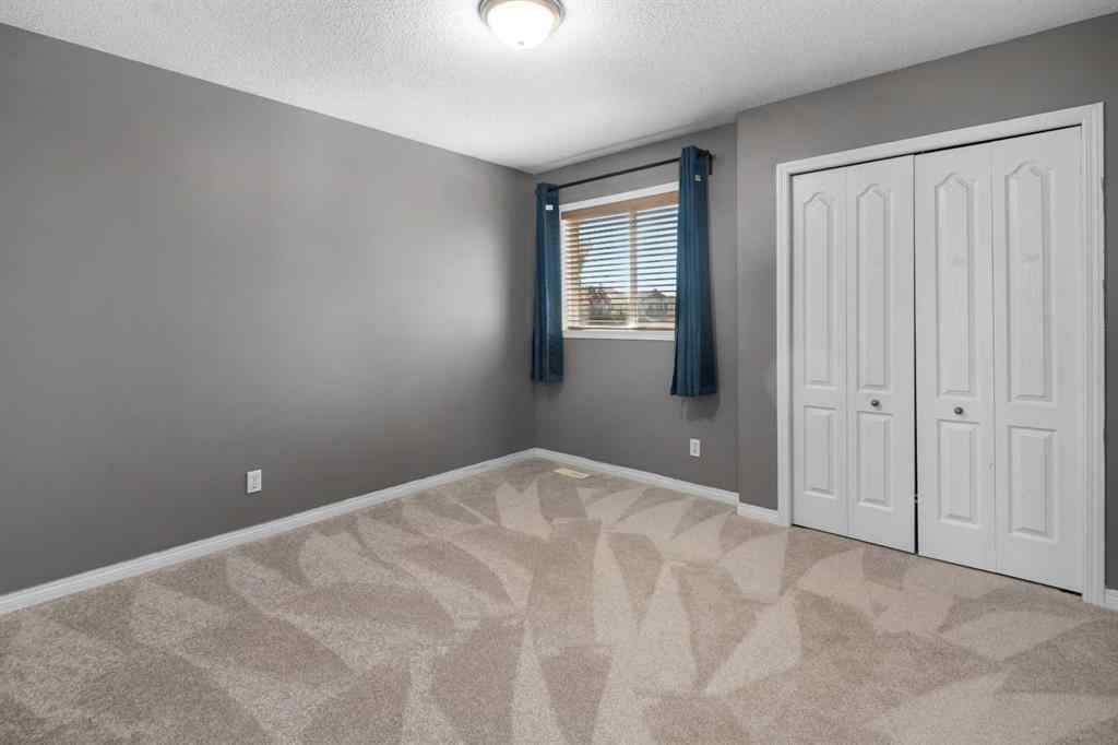 MLS® A2251252 - 329 Bridleridge Way SW in Bridlewood Calgary, Residential