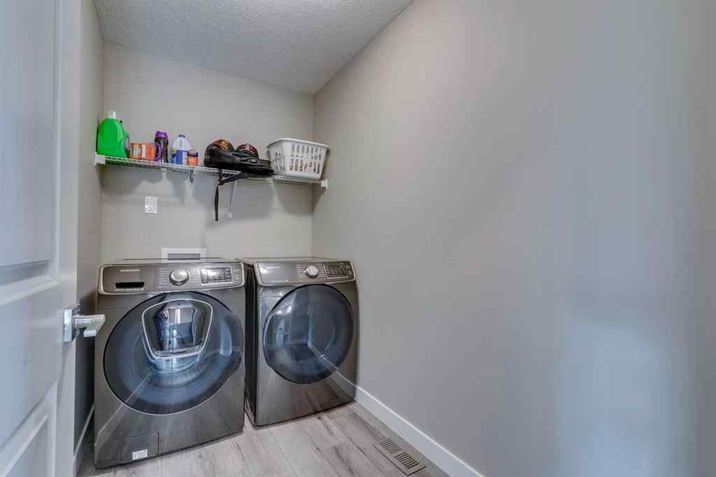 MLS® A2251261 - 153 Walgrove Terrace SE in Walden Calgary, Residential