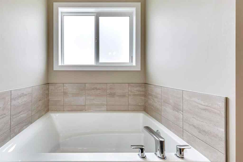 MLS® A2251261 - 153 Walgrove Terrace SE in Walden Calgary, Residential