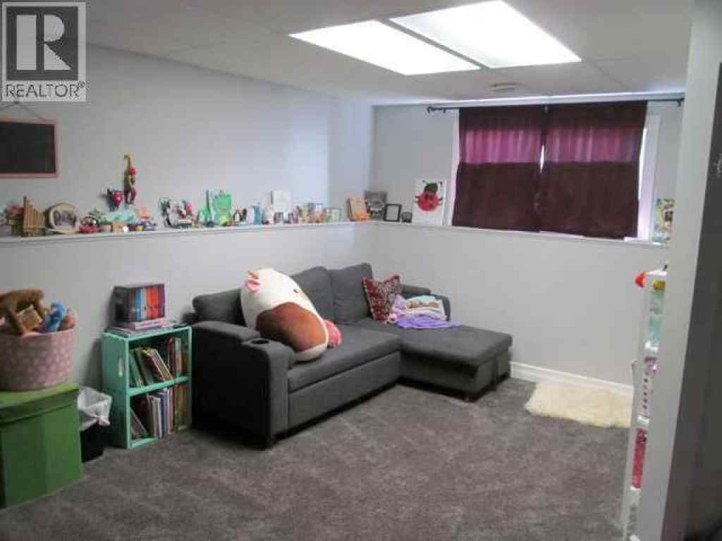 MLS® A2251303 - 9204 102nd Avenue  in NONE Sexsmith, Residential