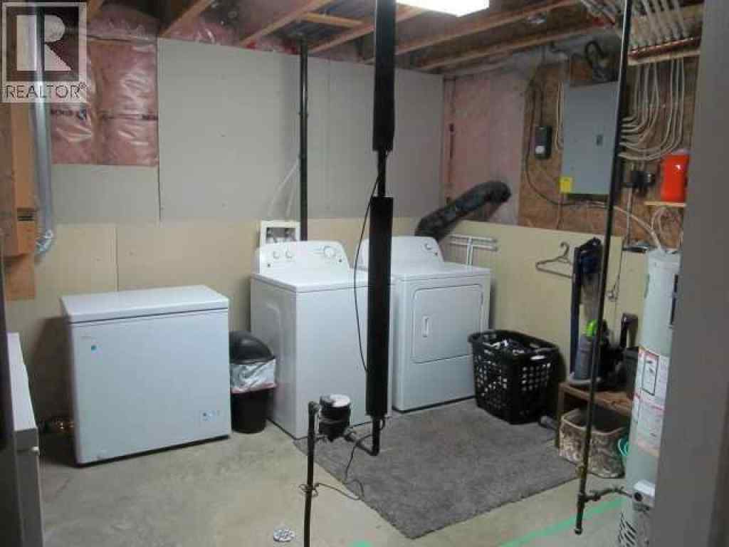 MLS® A2251303 - 9204 102nd Avenue  in NONE Sexsmith, Residential