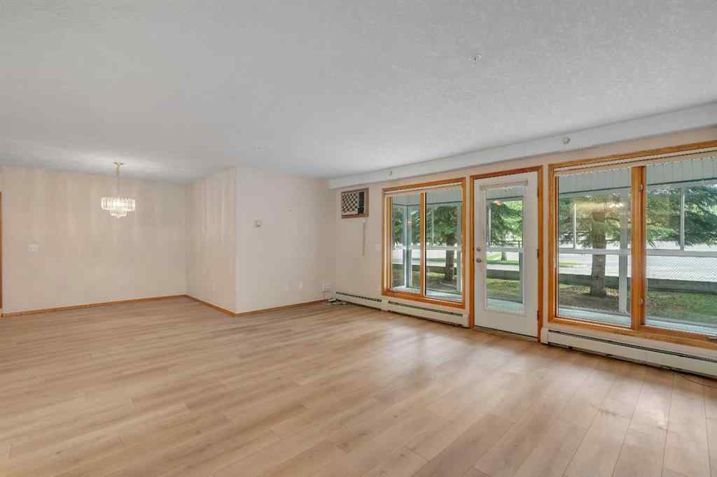 MLS® A2251307 - Unit #109 7239 Sierra Morena Boulevard SW in Signal Hill Calgary, Residential