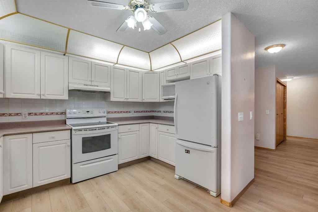 MLS® A2251307 - Unit #109 7239 Sierra Morena Boulevard SW in Signal Hill Calgary, Residential