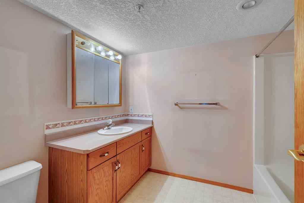 MLS® A2251307 - Unit #109 7239 Sierra Morena Boulevard SW in Signal Hill Calgary, Residential