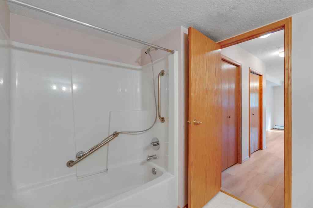 MLS® A2251307 - Unit #109 7239 Sierra Morena Boulevard SW in Signal Hill Calgary, Residential