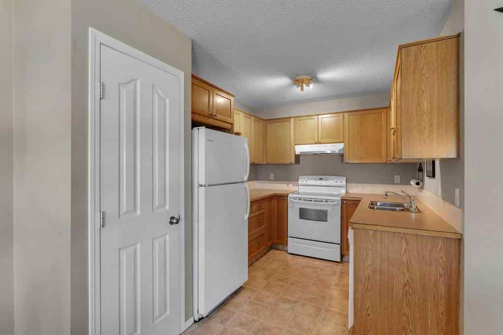 MLS® A2251315 - Unit #23 156 Canoe Drive SW in Canals Airdrie, Residential