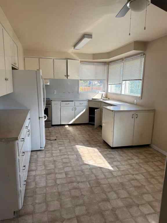 MLS® A2251327 - 9204 100 Street  in Swanavon Grande Prairie, Residential