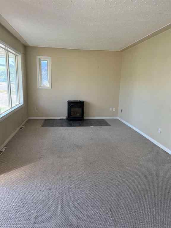 MLS® A2251327 - 9204 100 Street  in Swanavon Grande Prairie, Residential