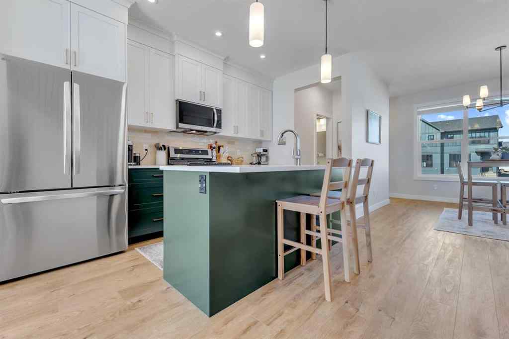 MLS® A2251329 - 547 Rowmont Boulevard NW in Haskayne Calgary, Residential